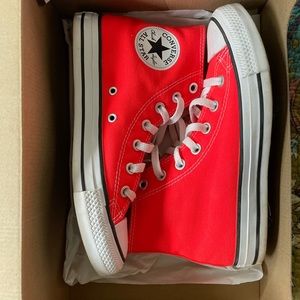 Bright red orange converse
